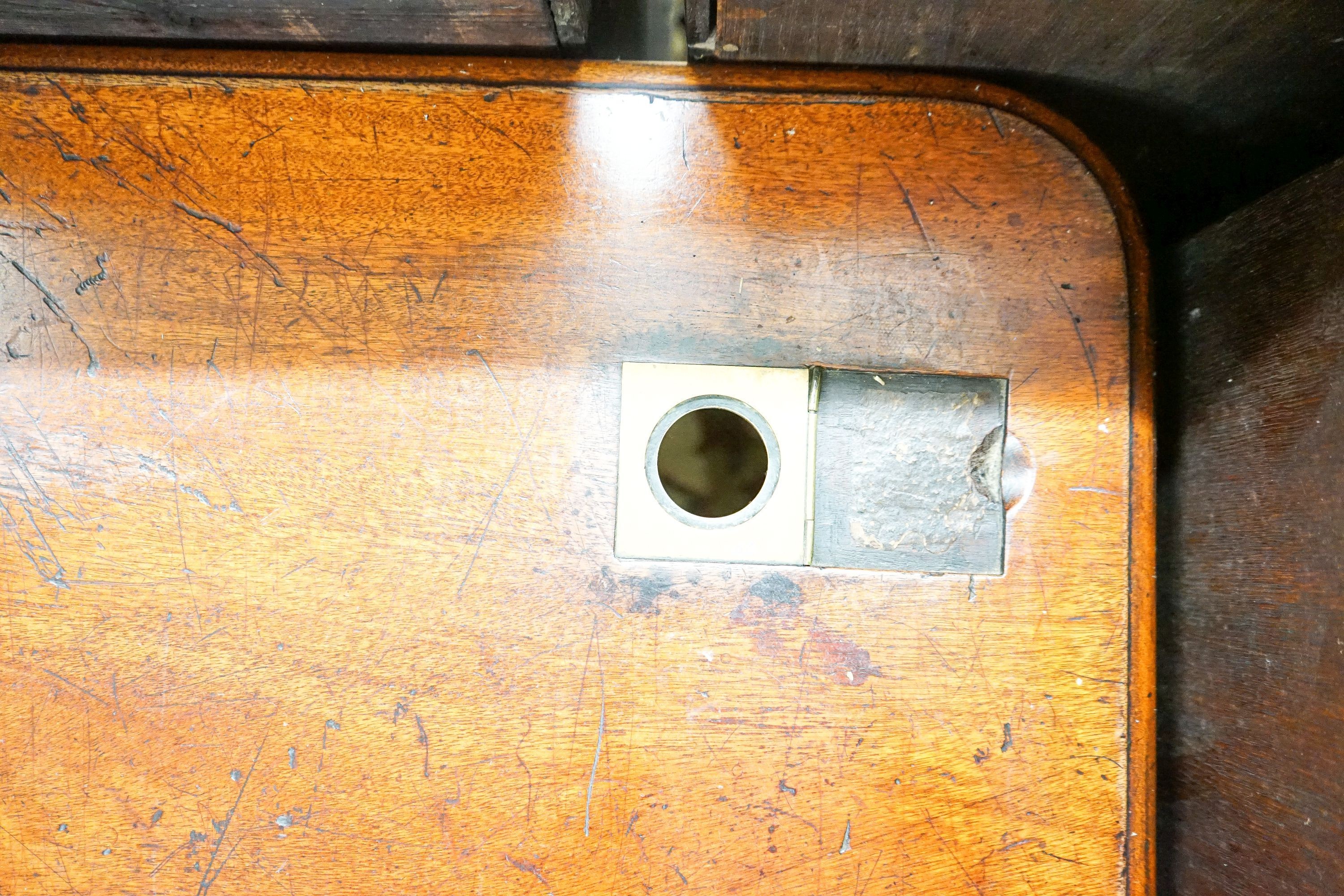 A Victorian rectangular mahogany writing table, from The Library of the Royal College of Surgeons, London, width 114cm, depth 68cm, height 77cm